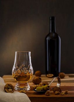Still life with drinks and nuts
