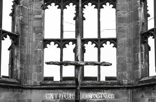 Father forgive, church window in ruin Coventry