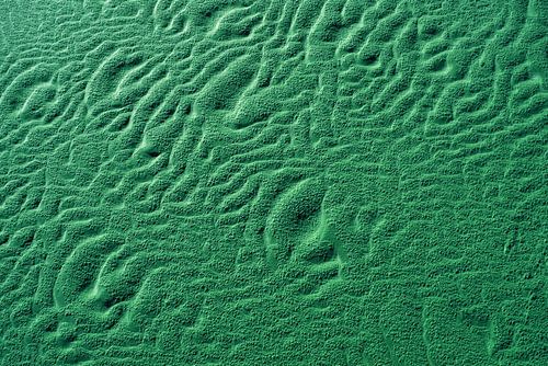 Golfstructuren in het zand van het strand van Langeoog