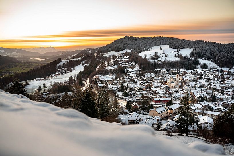 Oberstaufen in winter at sunset by Leo Schindzielorz