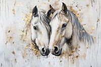 Two white horses with gold