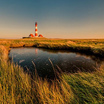 Zonsondergang bij de vuurtoren van Westerhever van Sebastian Leistenschneider