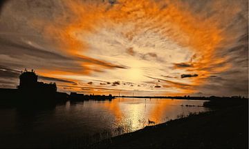 Sunset at the river van Dick Meijdam