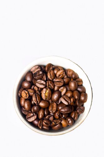 koffiebonen in een koffiekop