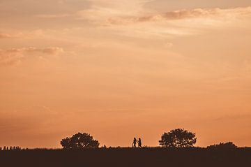 Promenade au coucher du soleil sur Nancy van Verseveld