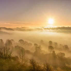 Foggy sunrise above the Fromberg in South Limburg by John Kreukniet