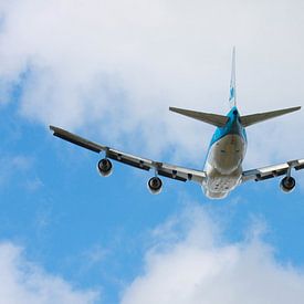 Departing Boeing 747 heading into the clouds by Roque Klop