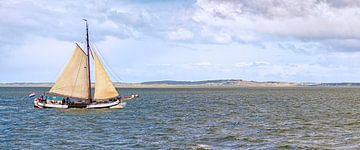 Tjalk (historic sailboat) near the isle of Vlieland by Roel Ovinge