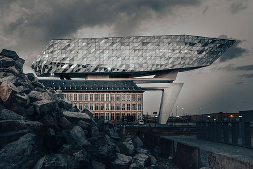 Port House Antwerp under threatening clouds