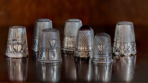 Oude zilveren vingerhoedjes