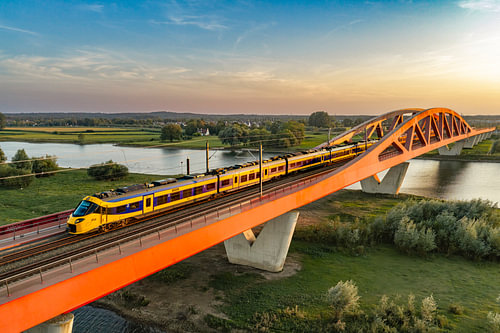 ICNG intercity train driving over a railway bridge by Sjoerd van der Wal Photography