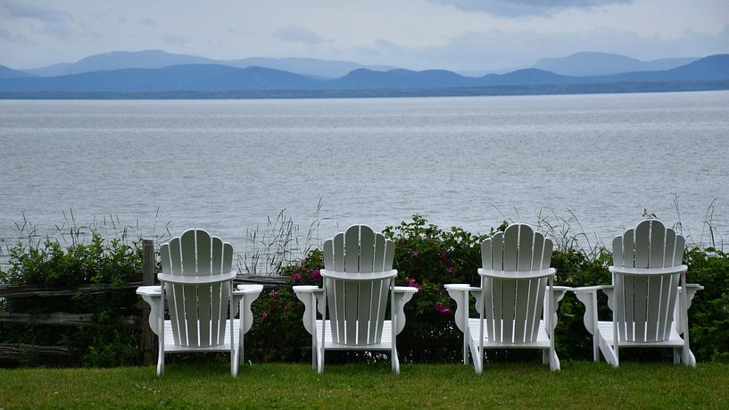 Chairs on the banks of the Saint-Laurent river by Claude Laprise