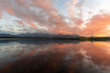 Sunset over the Hopfensee lake with view of the Allgäu Alps by Leo Schindzielorz