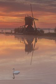 Kinderdijk mills before sunrise with high clouds by Rob Saly