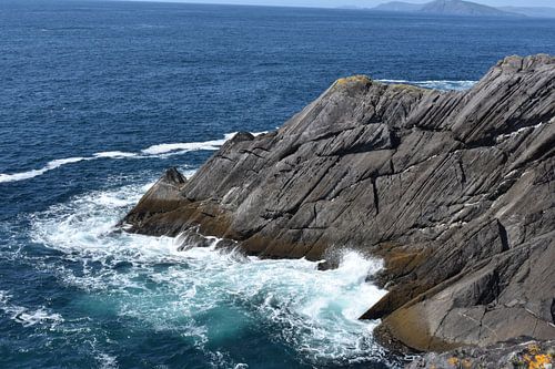Waves crash on rocks along the Irish coast