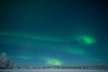 Noorderlicht in Lapland van Evelien Huisman