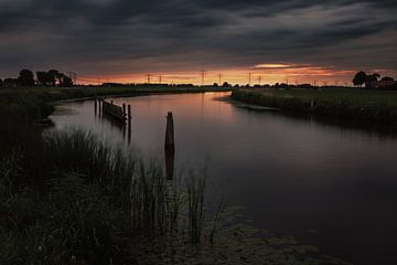 Zonsondergang op het Kamper Eiland van Jos Reimering