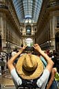 Tourist in the oldest shopping center in Italy by Romuald van Velde thumbnail