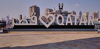 Porto Arabia in de parel Doha, Qatar daglicht opname tonen Love QATAR teken