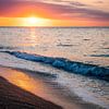 Zonsondergang aan een strand in Spanje van Tim Demel