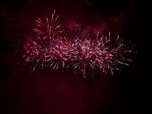 Red / purple fireworks during Divali / Old & New