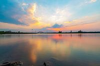 Colourful evening light reflected in the water, shining after sunset