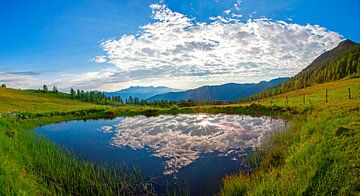 Double cloud cover on the Lackenalm by Christa Kramer