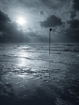 Ameland beach with flag