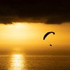 Paragliding into the Sunset by Alexander Schulz