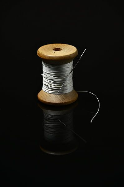 Bobbin of thread by Lies Nierop Fotografie