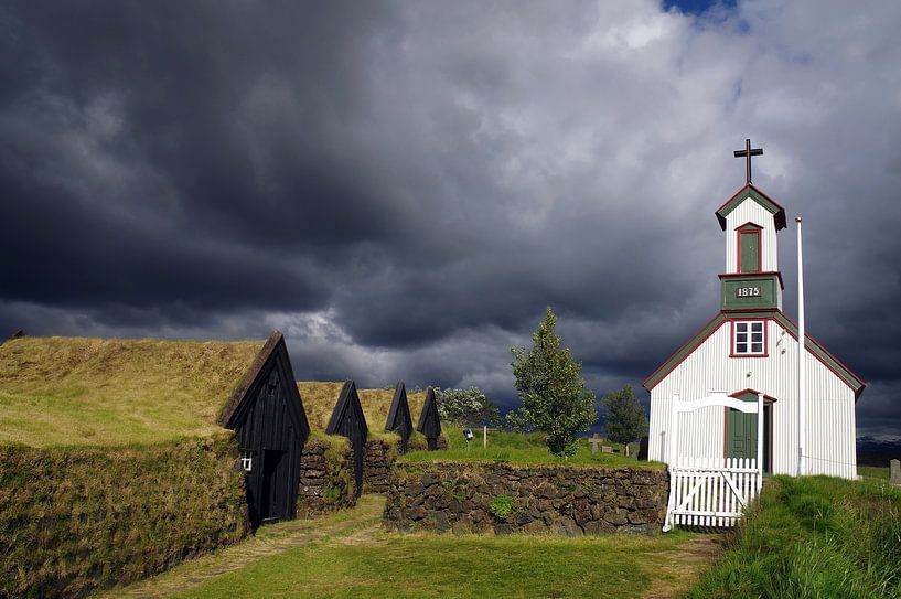 Dark clouds over the church of Keldur by Reinhard  Pantke