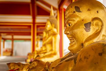 Golden Buddha in Thai temple by Jack Donker