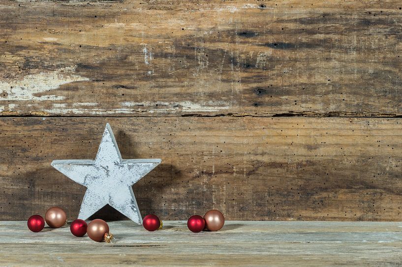 Christmas wood background with star shape and baubles decoration by Alex Winter