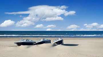 Speedboats on an empty tropical beach against a blue sky  by Tony Vingerhoets