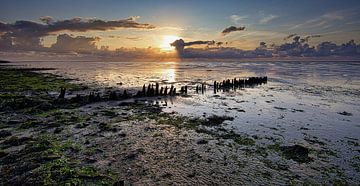 Zonsondergang bij de waddenzee van peterheinspictures