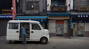 Morning Delivery in a Quiet Tokyo Street by Manu Terrones