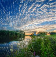 Panorama of sunset Windmill Butterfly along the river the Linge in the Betuwe