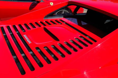 Detail on a red Ferrari F355 sports car
