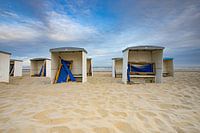 beach cottages on the beach of katwijk by the sea