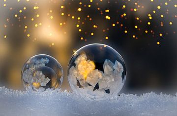 christmas, glowing frozen soap bubble with fireflies and golden by Margit Kluthke