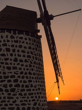 Windmill at sunset. by Carlos Charlez