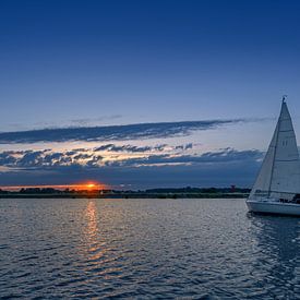 Zeilen bij zonsondergang van Patrick Herzberg