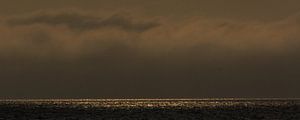 Donkere wolkenluchten boven de Waddenzee