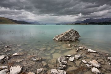 Lake Tekapo, New Zealand - January 8, 2020 : A heavily cloudy afternoon at Lake Tekapo by Anges van der Logt