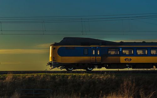 Train with sunset in the same colors