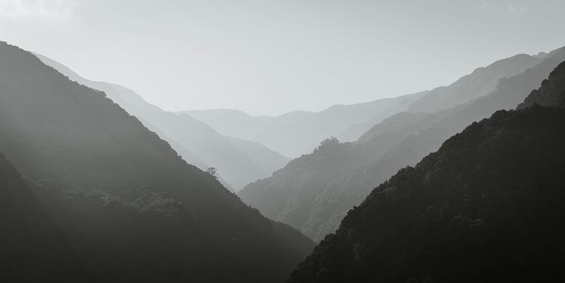 Layered mountains in black and white by Luc van der Krabben