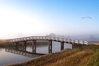 Brug met mist en ganzen van Inge van den Brande thumbnail