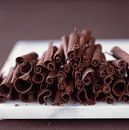 Ein Haufen Schokoladenröllchen von BeeldigBeeld Food & Lifestyle Miniaturansicht