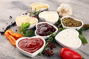 Sauces Assortment. Set of various sauces in bowls with ketchup, mayonnaise, pesto and mustard by Beats