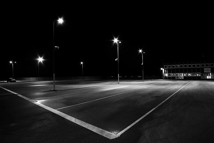 the empty parking lot at the harbour by Norbert Sülzner